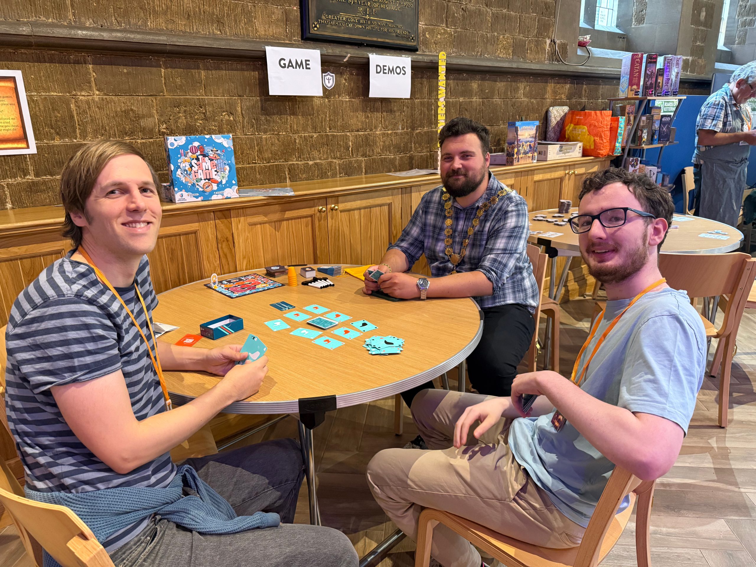 Volunteers Jonathon and James playing TRND with Ben the Mayor